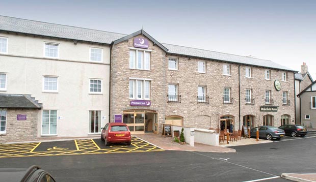 Car park area and exterior of Premier Inn Kendal Central